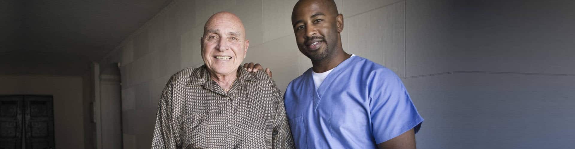 senior man and caregiver